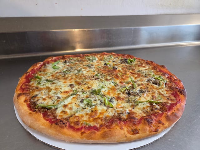 Hand Stretched Pizza.